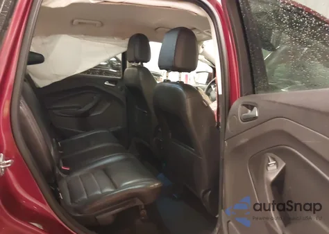 2016 Ford Escape Titanium z USA, uszkodzony, nr VIN 1FMCU9JX0GUC65615